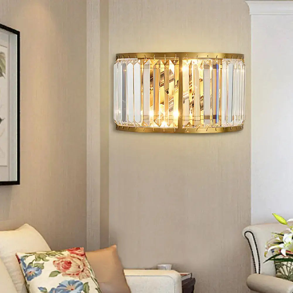 Modern black and gold crystal wall sconce with vertical crystal prisms and 16 inch fixture height for bedroom use e12 e14