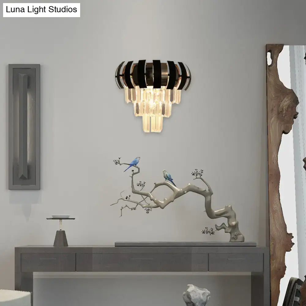 Modern black and gold metallic wall sconce with cascading clear crystal droplets for elegant corridor wall light