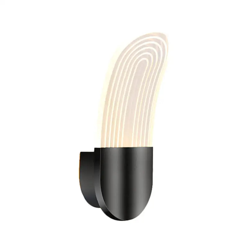 Modern black and gold curved led sconce light wall lamp with softly glowing diffuser and concentric white lines