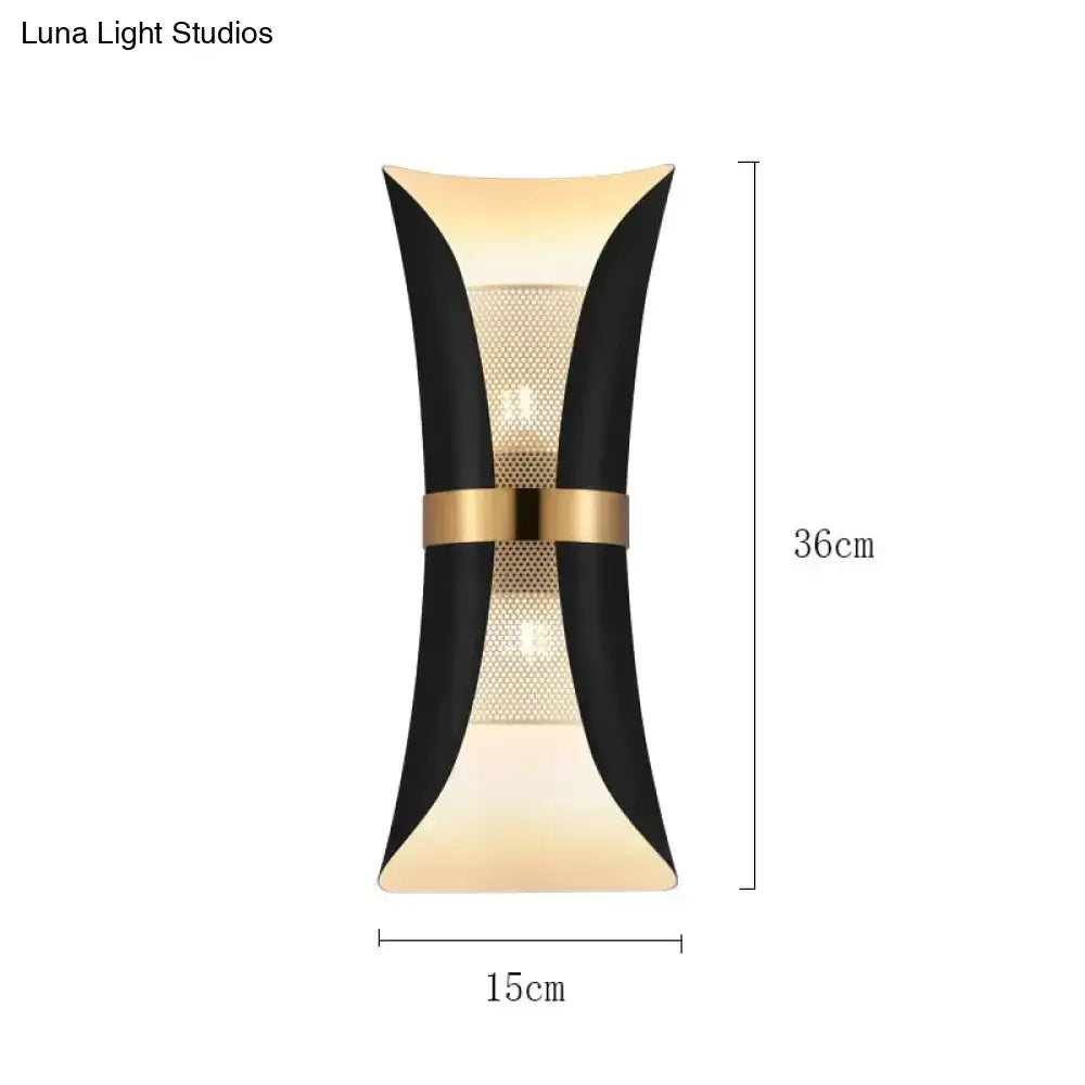 Modern black and gold curved wall lamp with sleek design and central mesh panel for bedroom lighting