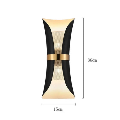 Modern black and gold curved wall lamp with sleek design ideal for bedroom lighting and decor
