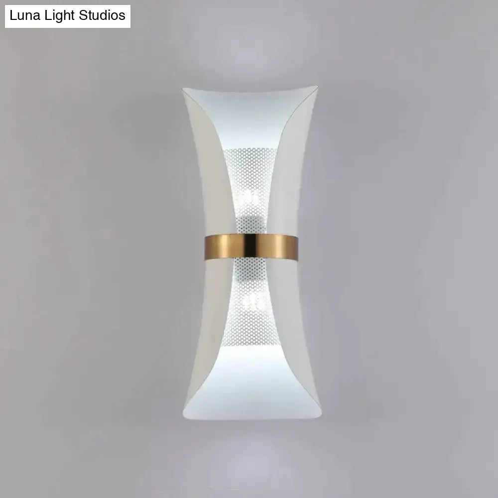 Modern white acrylic wall lamp with gold-toned metallic band and perforated mesh detail for contemporary bedroom use