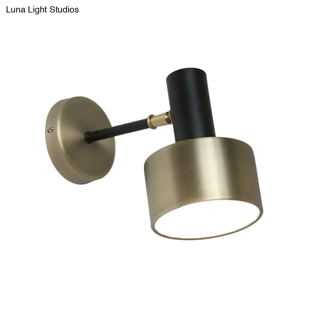 Modern black and gold cylinder sconce metal wall lighting with matte black neck and brushed brass base for living room