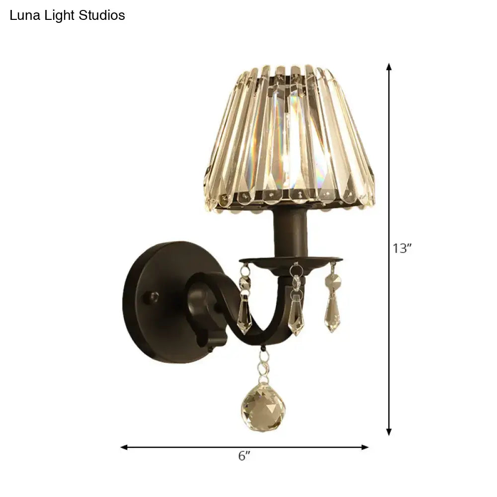 Modern black wrought iron wall sconce with black gold finish crystal shade and tiered faceted crystals fixture height