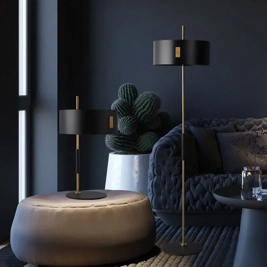 Modern black metal e27 floor lamp with gold accent and slender brass pole for decorbites living room lighting