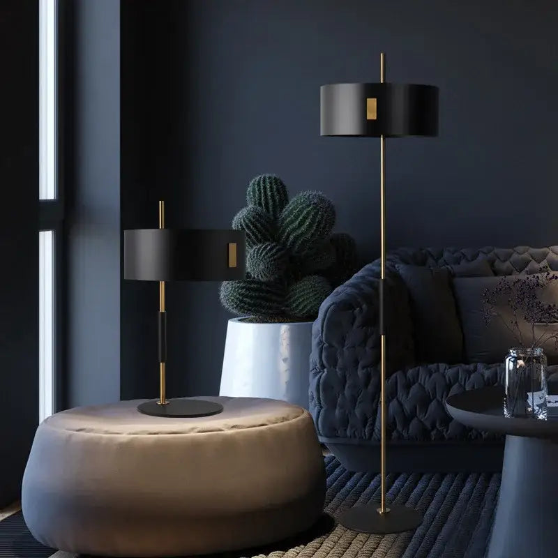 Modern black metal e27 floor lamp with gold accent and slender brass pole for decorbites living room lighting