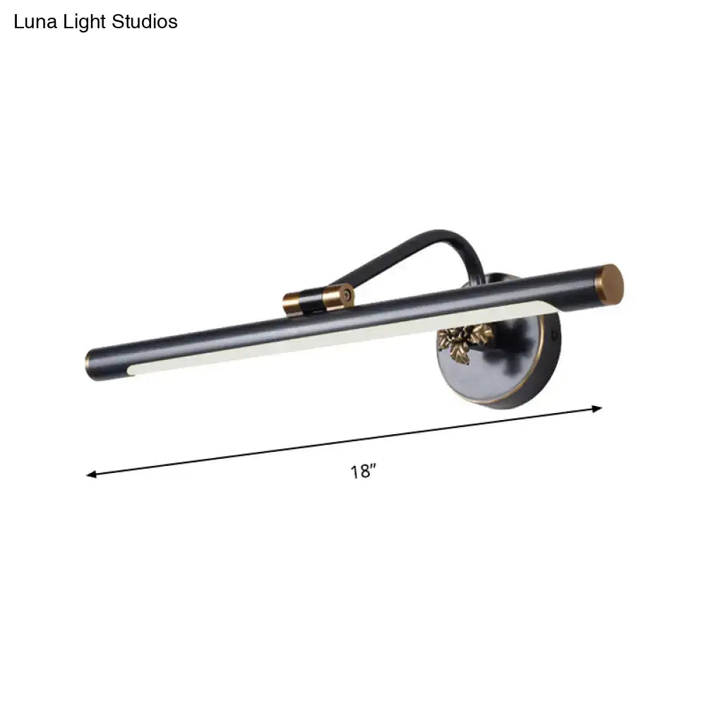 Modern black and gold floral led vanity wall sconce with brass accents and elongated cylindrical light bar for vanity wall lighting