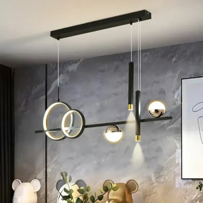 Modern black and gold decorbites led pendant lights with circular rings and spherical bulbs for kitchen and office use