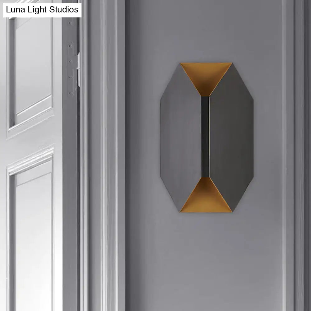 Modern black and gold geometric led wall lamp with matte gray exterior and gold interior accents for bedroom sconce