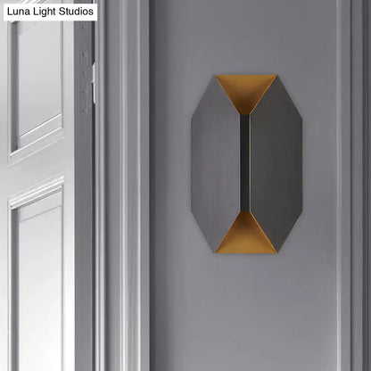 Modern black and gold geometric led wall lamp with matte gray exterior and gold interior accents for bedroom sconce