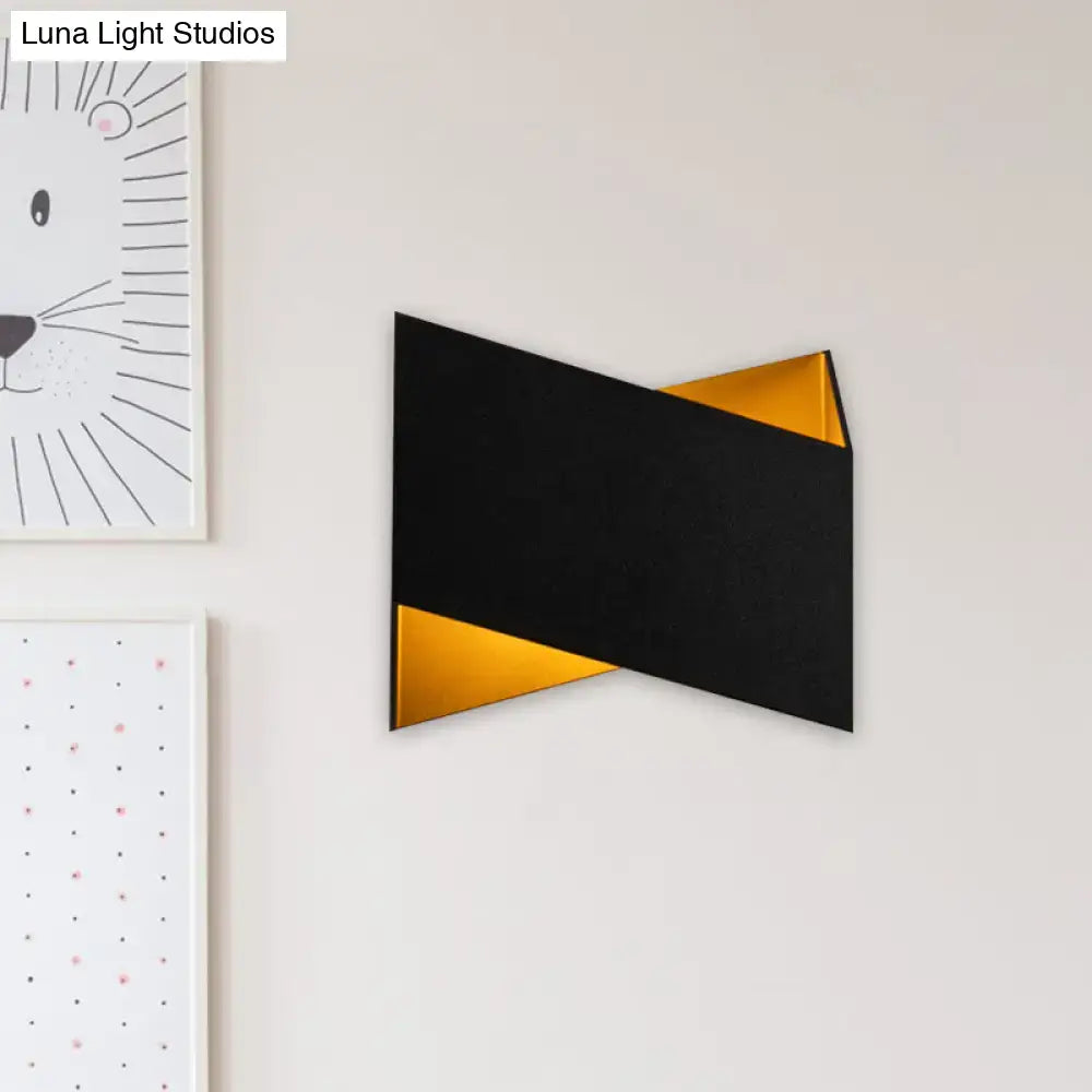 Modern black and gold geometric metal body wall lamp with angular overlapping panels stairway light type design