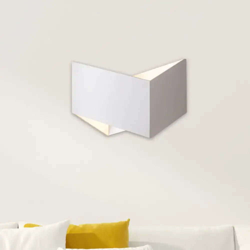 Modern white geometric wall lamp with metal body and clean angular design for contemporary stairway lighting