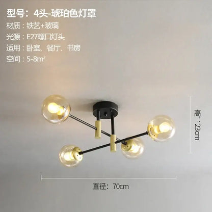 Modern black and gold decorbites glass ball led chandelier with four spherical amber glass bulbs for living room decor