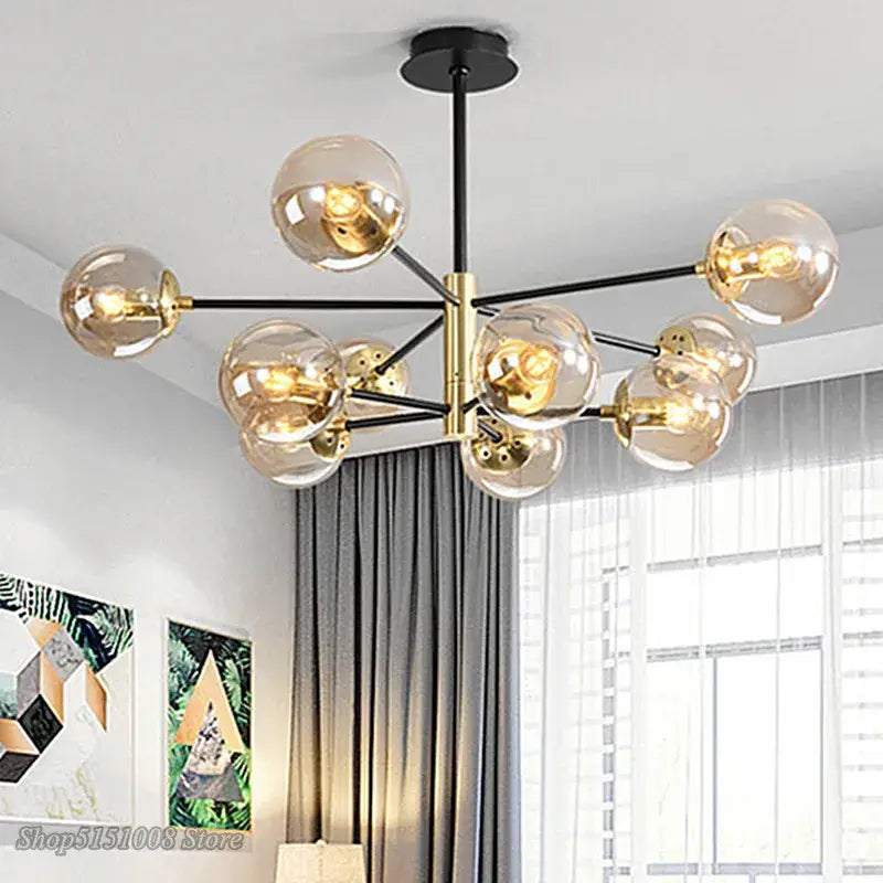 Modern black and gold glass ball led chandelier with a black rod and gold arms holding clear glass globes for living room decorbites glass ball