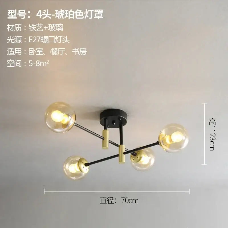 Modern black and gold decorbites glass ball led chandelier with four brass arms and amber glass bulbs for living room light