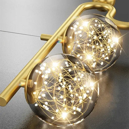 Modern black and gold chandelier pendant with two glass ball led orbs filled with golden wire for dining room decorbites glass ball