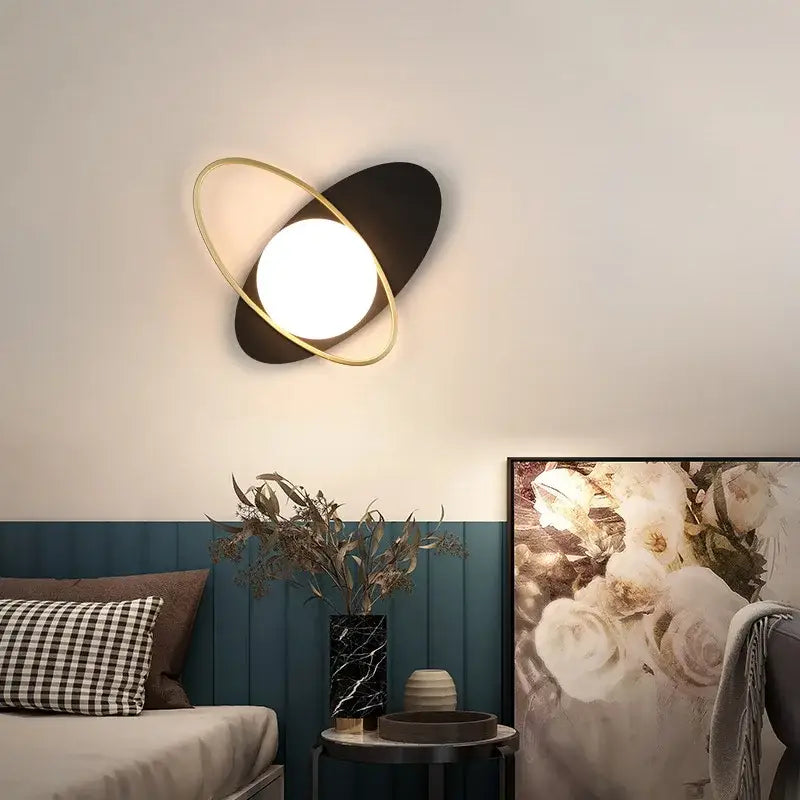 Modern black and gold glass ball led wall sconce with glowing circular light for bedroom decorbites glass ball lamp