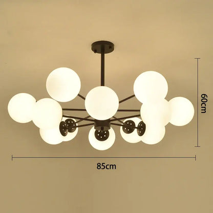 Modern black gold glass pendant light with multiple frosted white spherical globes for living room decorbites black gold