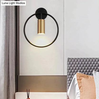 Modern black and gold irwin wall lamp with circular sleek design for bedroom wall sconce lighting
