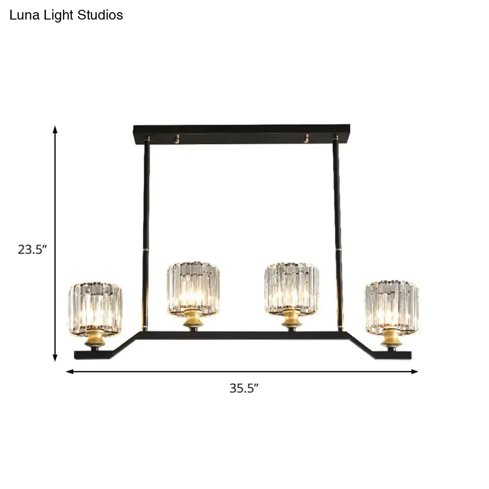 DecorBites modern island pendant light with black metal, gold accents, and clear crystal cylinder barrel shade shape
