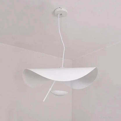 White minimalist pendant light with sleek curved metallic shade and slender cord for modern decorbites gold texture decor