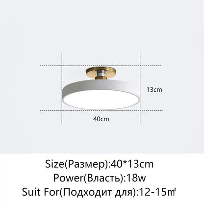 Modern black and gold decorbites led ceiling lamp with white circular light and gold-toned mounting base for living room
