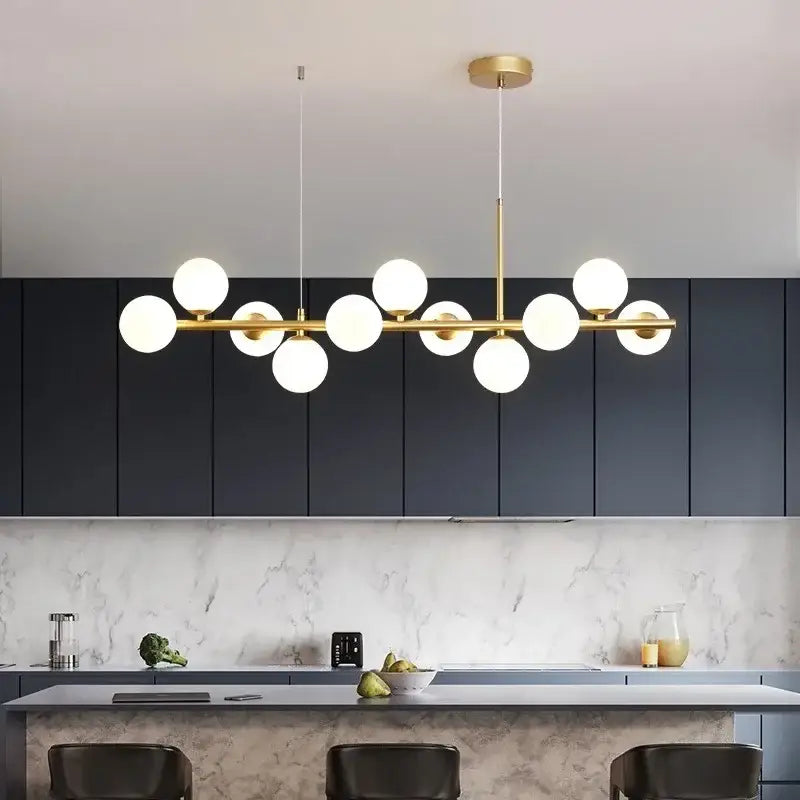 Modern black and gold led pendant chandelier with gold-toned linear design and frosted glass globe bulbs for living room