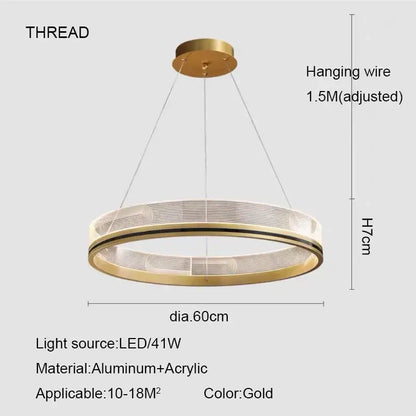 Gold led pendant light with modern circular design made of aluminum and acrylic for dining room use