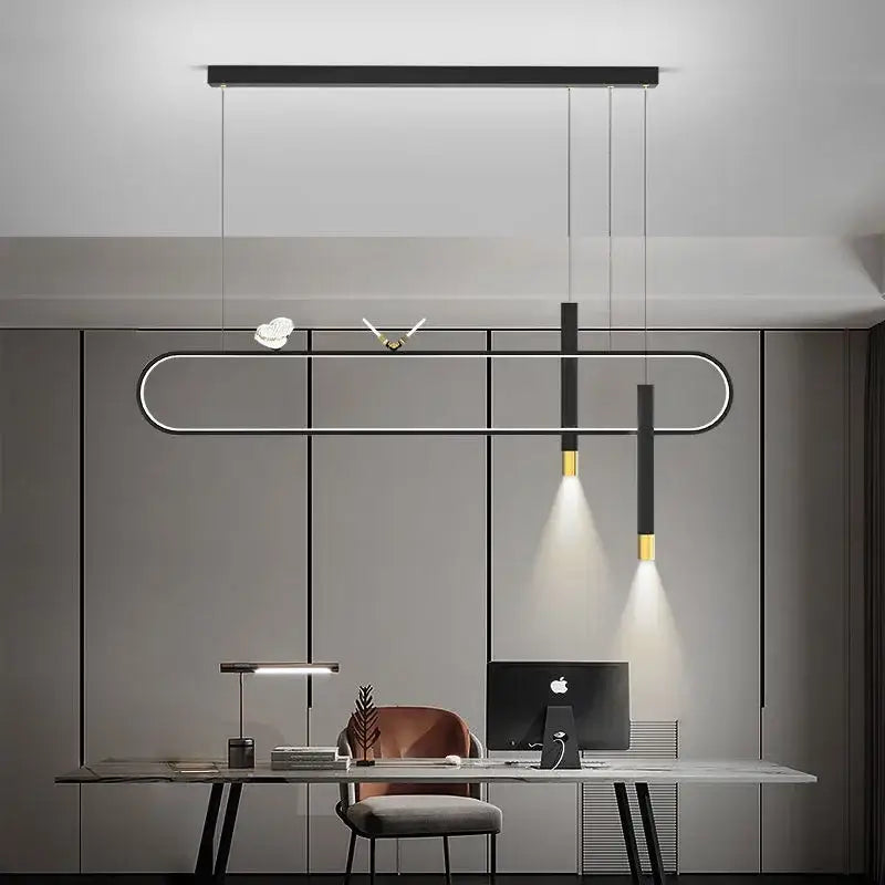 Modern minimalist DecorBites LED pendant lights with black and gold oval frame suspended above a contemporary desk