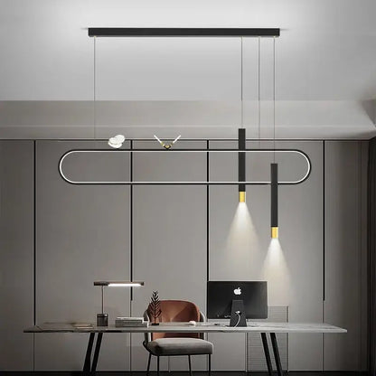 Modern minimalist DecorBites LED pendant lights with black and gold oval frame suspended above a contemporary desk