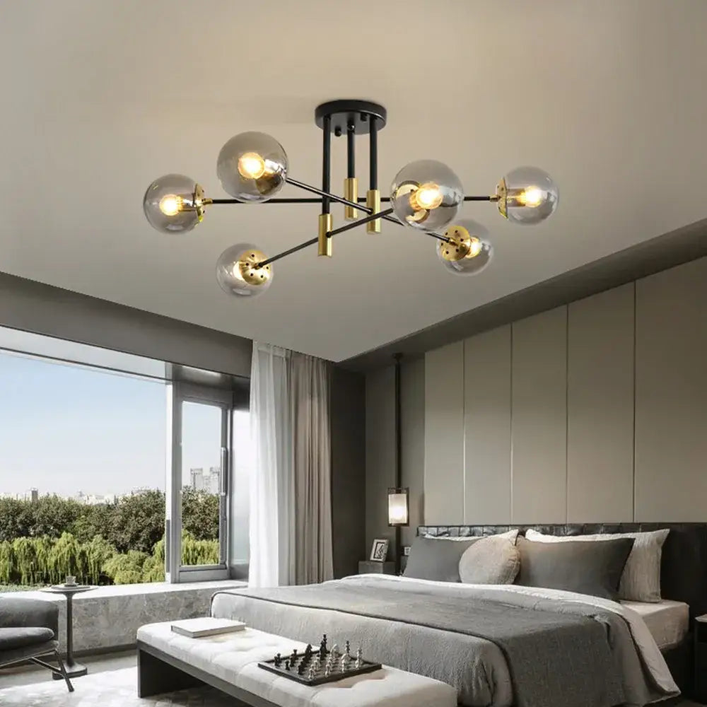 Modern black and gold led round ball chandelier with clear glass globe bulbs for dining room lighting