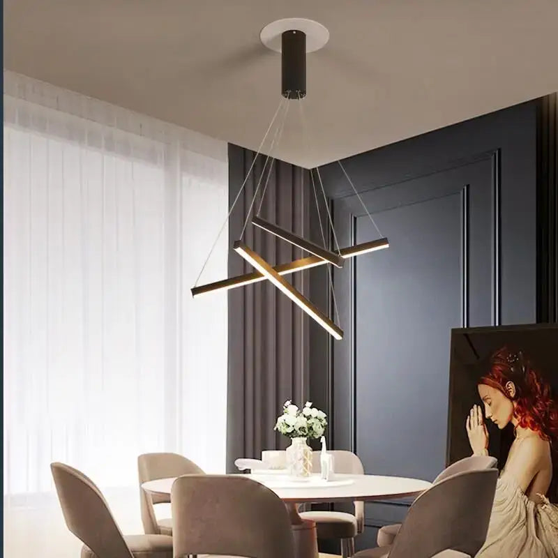 Modern black led stair chandelier with intersecting geometric light bars suspended by thin cords for decorbites black led decor