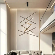 Modern black and gold led stair chandelier with intersecting rods for living room decorbites black led pendant light