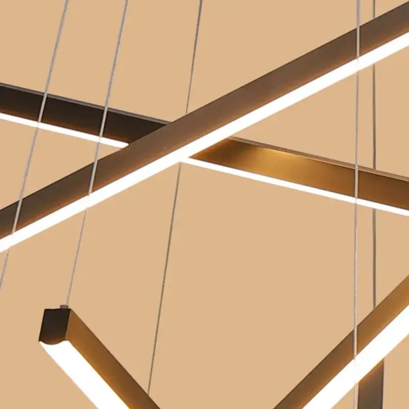 Modern black and gold led stair chandelier with sleek geometric metal frames and bright white led strips decorbites black led