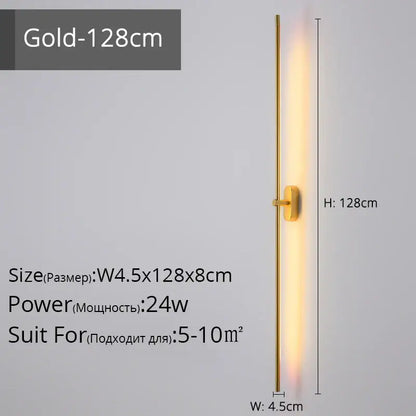 Gold-colored sleek modern wall lamp with slim vertical led strip emitting warm light for bedroom decorbites led strip wall