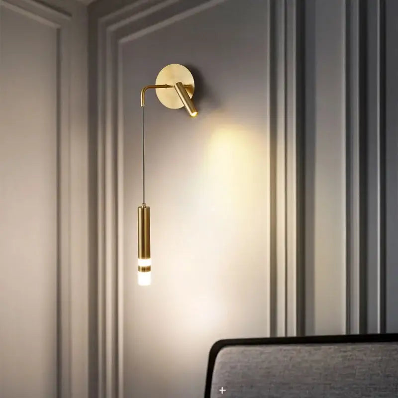 Modern black and gold led wall lamp with gold-toned minimalist wall sconce and cylindrical led light by decorbites gold led