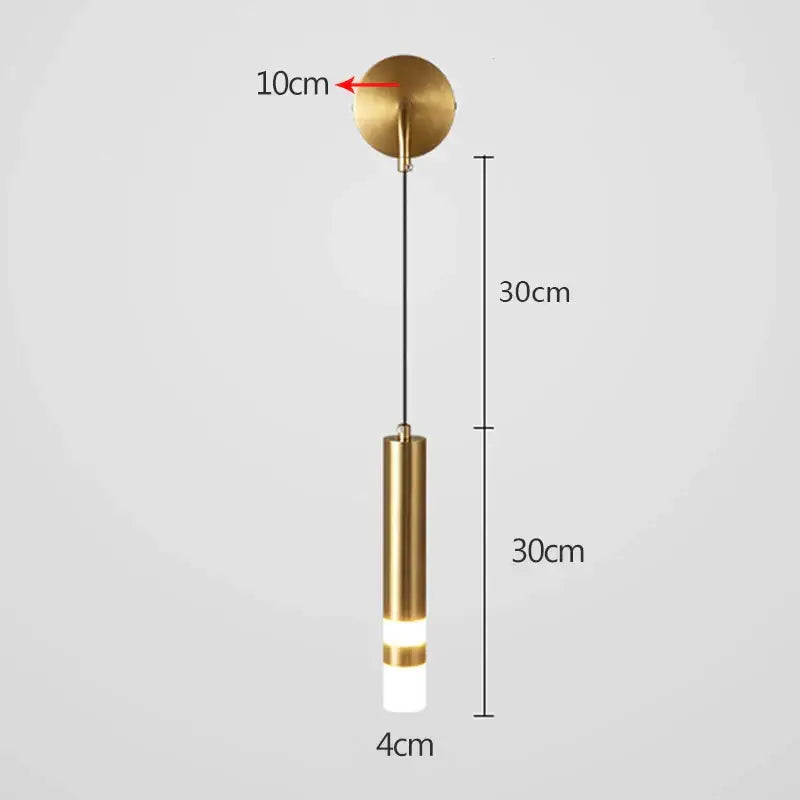 A sleek modern black and gold led wall lamp with brass finish and cylindrical body for bedroom reading decorbites gold led