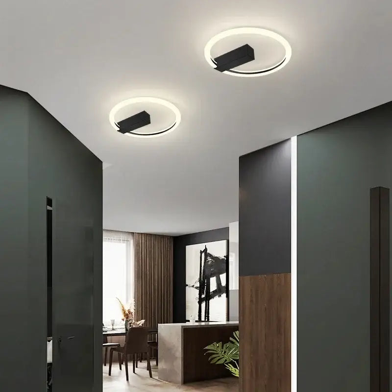 Modern black and gold led wall lamp with circular glowing rings and rectangular fixtures for living room lighting
