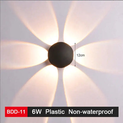 Modern black plastic wall lamp with six petal-shaped illuminated diffusers for sleek decorbites led wall lighting