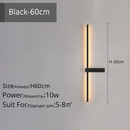 Modern black and gold led wall lamp with a sleek vertical bar emits warm ambient light for living room use