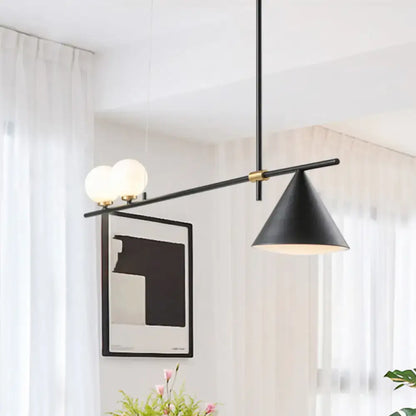 Modern black and gold metal cone island light with sleek horizontal bar and glass bulbs for dining room lighting