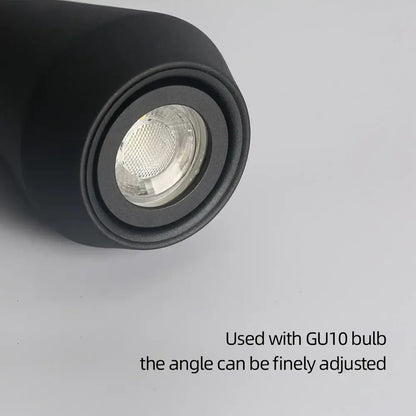 Modern black metal pendant chandelier featuring a black cylindrical recessed spotlight with gu10 bulb socket and adjustable angle