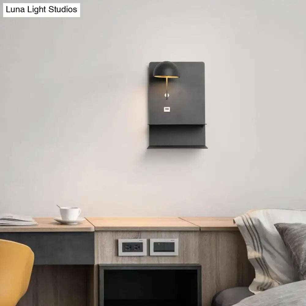 Modern metal black and gold metal wall light with pull chain and integrated power outlet for living room use