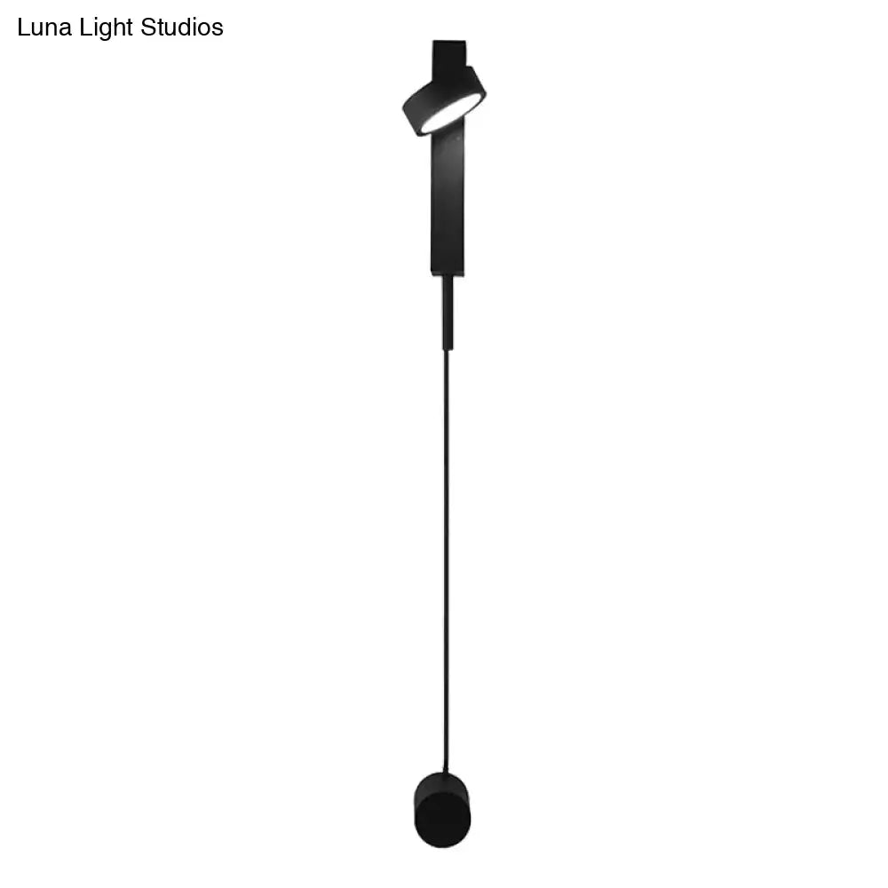 Modern black and gold metallic flush mount wall lighting with minimalist adjustable track light for bedroom use