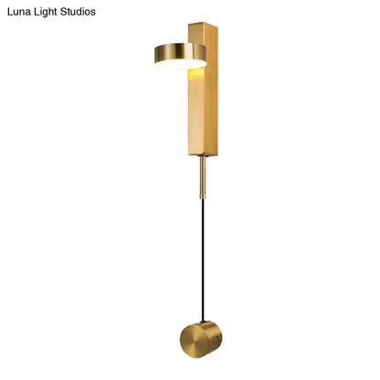 Modern black and gold metallic flush mount wall sconce with rectangular backplate and hanging spherical base for bedroom lighting