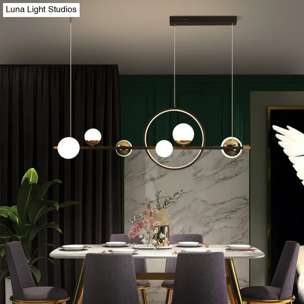 DecorBites™ modern black acrylic sphere led pendant light with gold accents and white glass bulbs ideal for restaurants