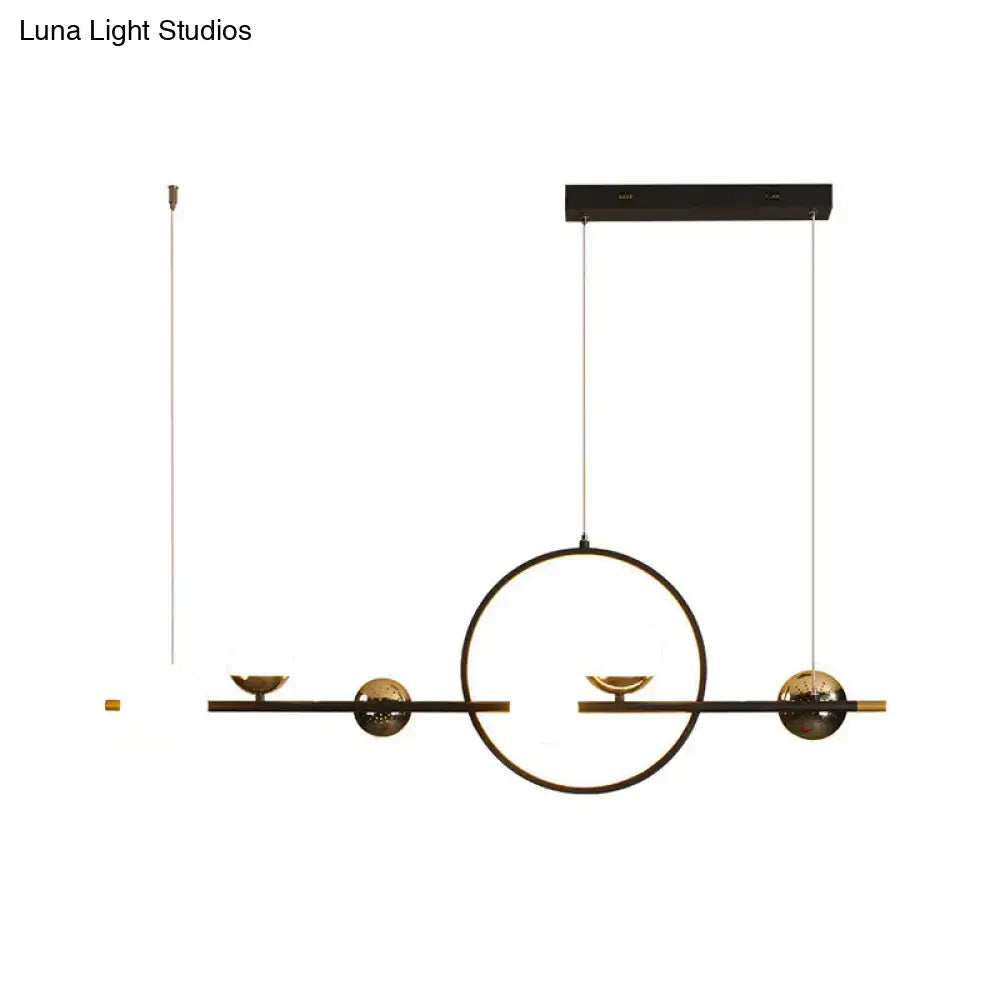 DecorBites modern black acrylic led pendant light with gold spherical accents and halo ring ideal for restaurants