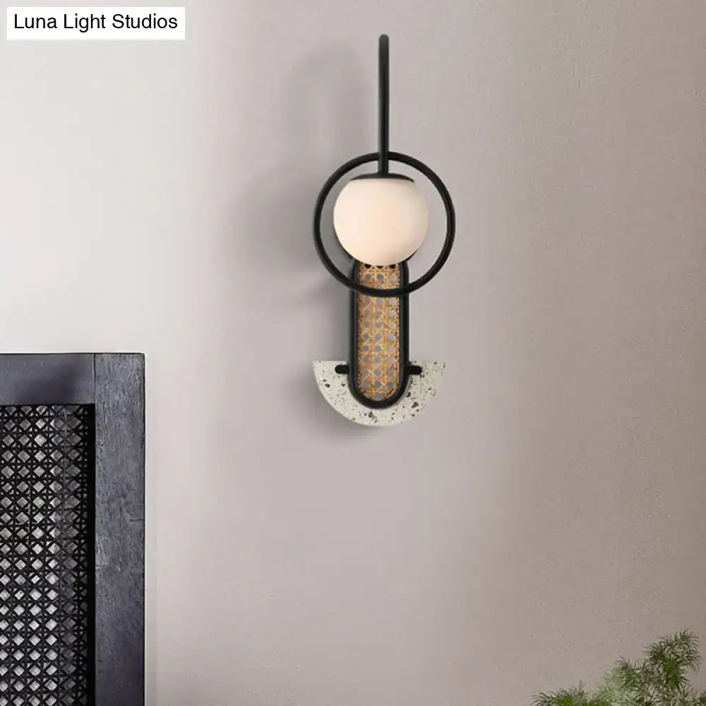 Modern black metal wall sconce with frosted opal glass ball, woven rattan accent, terrazzo base for bedroom lighting 110v-120v