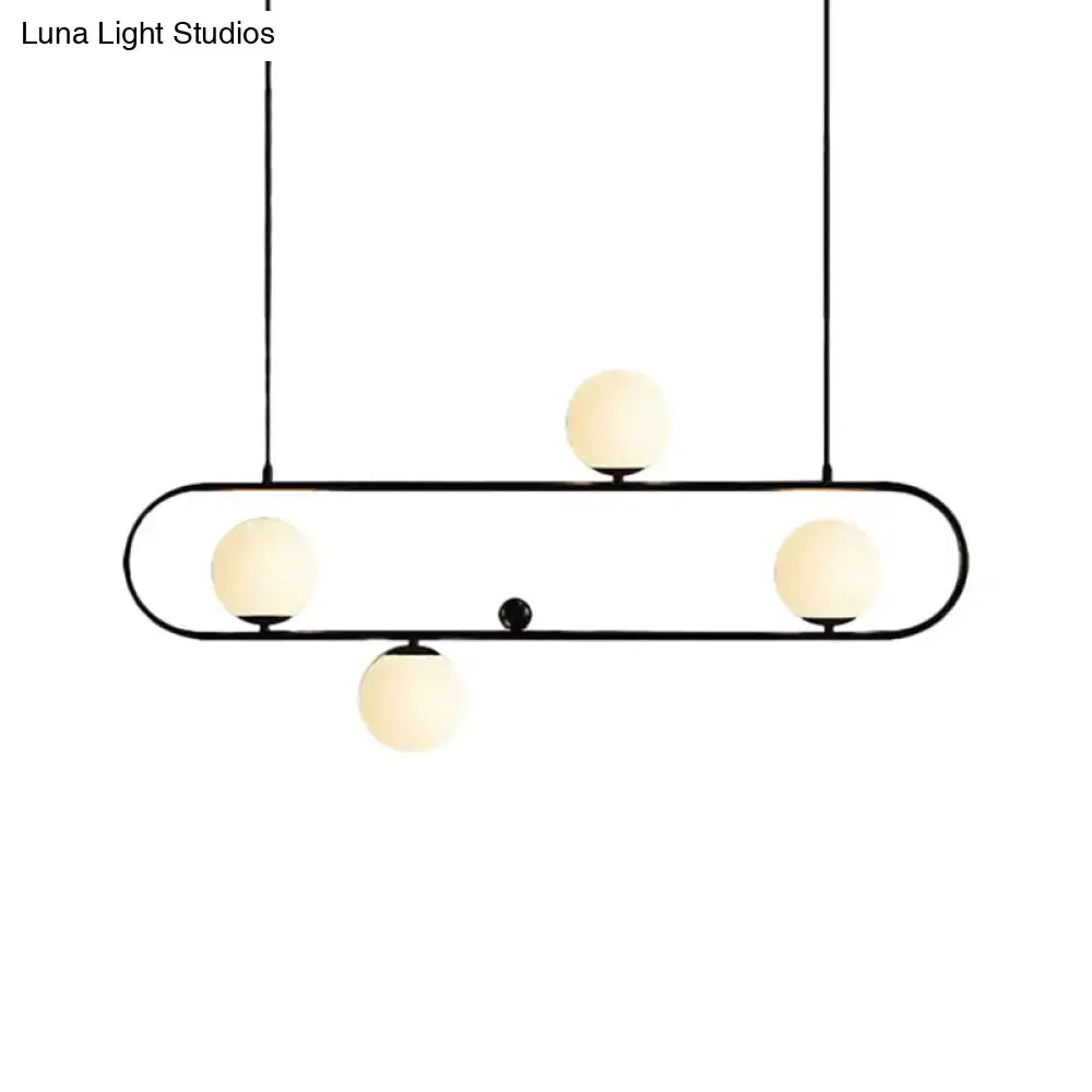 Modern black gold metal pendant light with four frosted opal glass globes for dining room with led or incandescent use