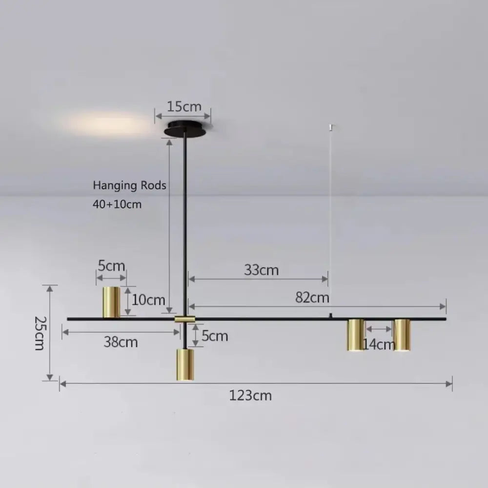 Modern black chandelier pendant light with sleek horizontal bar and gold cylindrical accents for kitchen island decorbites